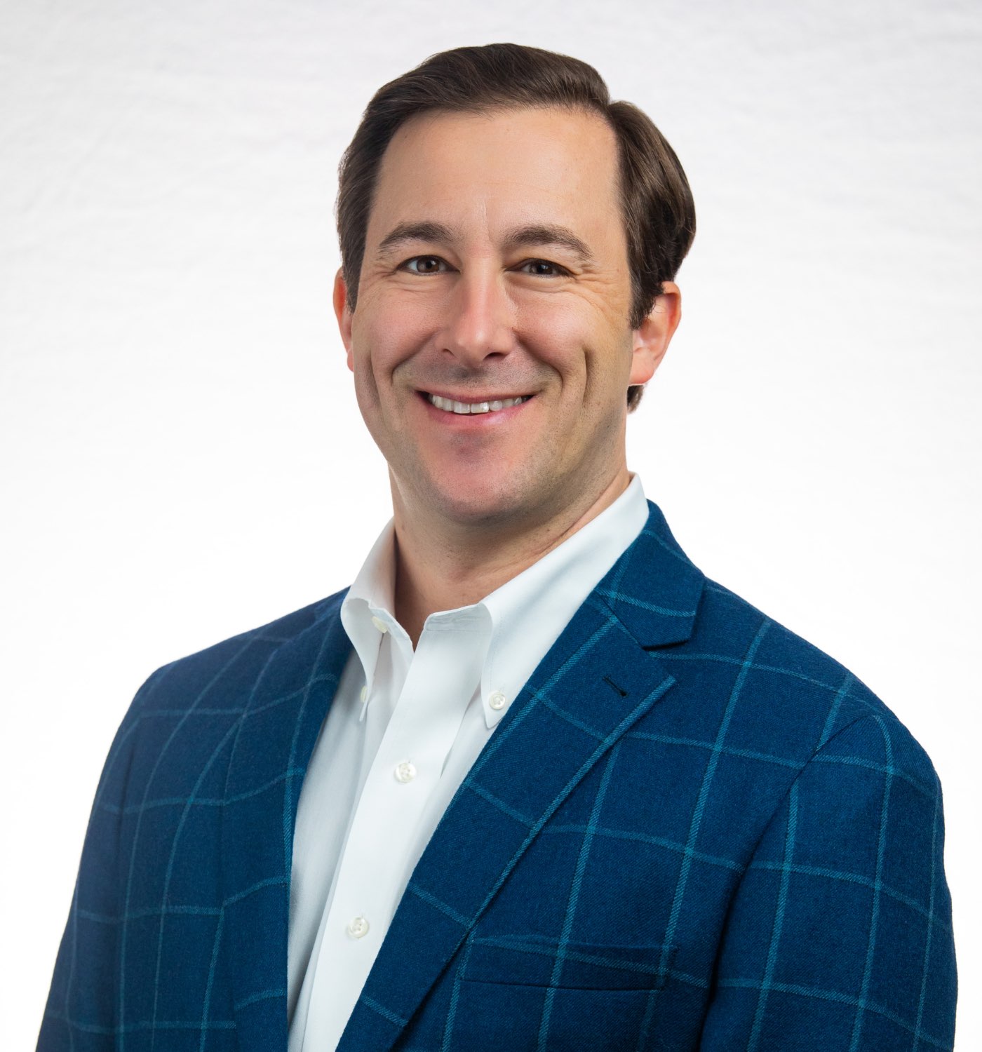 Headshot of Dr. Ficca in a suit